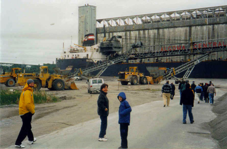 intrepid CPS'ers among the loaders, on their way to the ship (c) 2003 DB